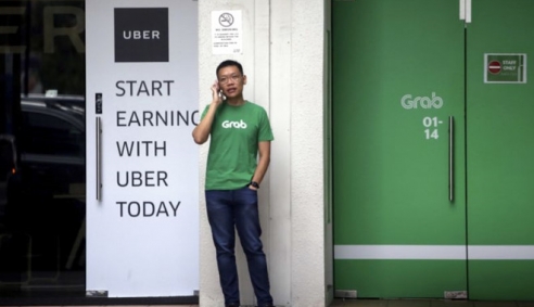 Bộ Công Thương điều tra chính thức vụ Grab mua Uber có dấu hiệu vi phạm luật cạnh tranh