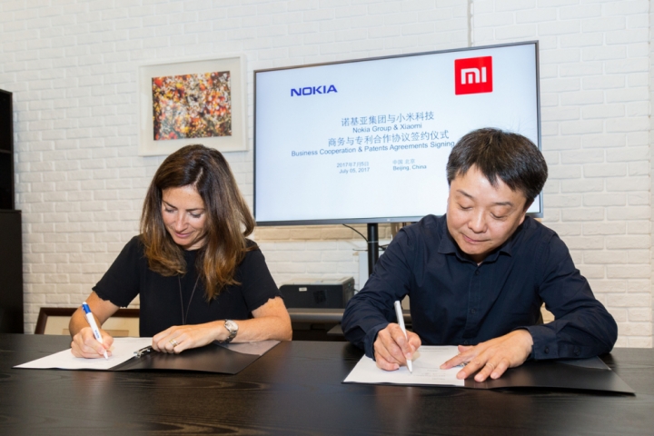 Xiaomi va Nokia hop tac cung nhau su dung bang sang che